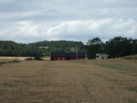 &Auml;skatorp. Tidigare g&aring;rd troligen p&aring; kullen till h&ouml;ger. /Hartwig B. mfl/